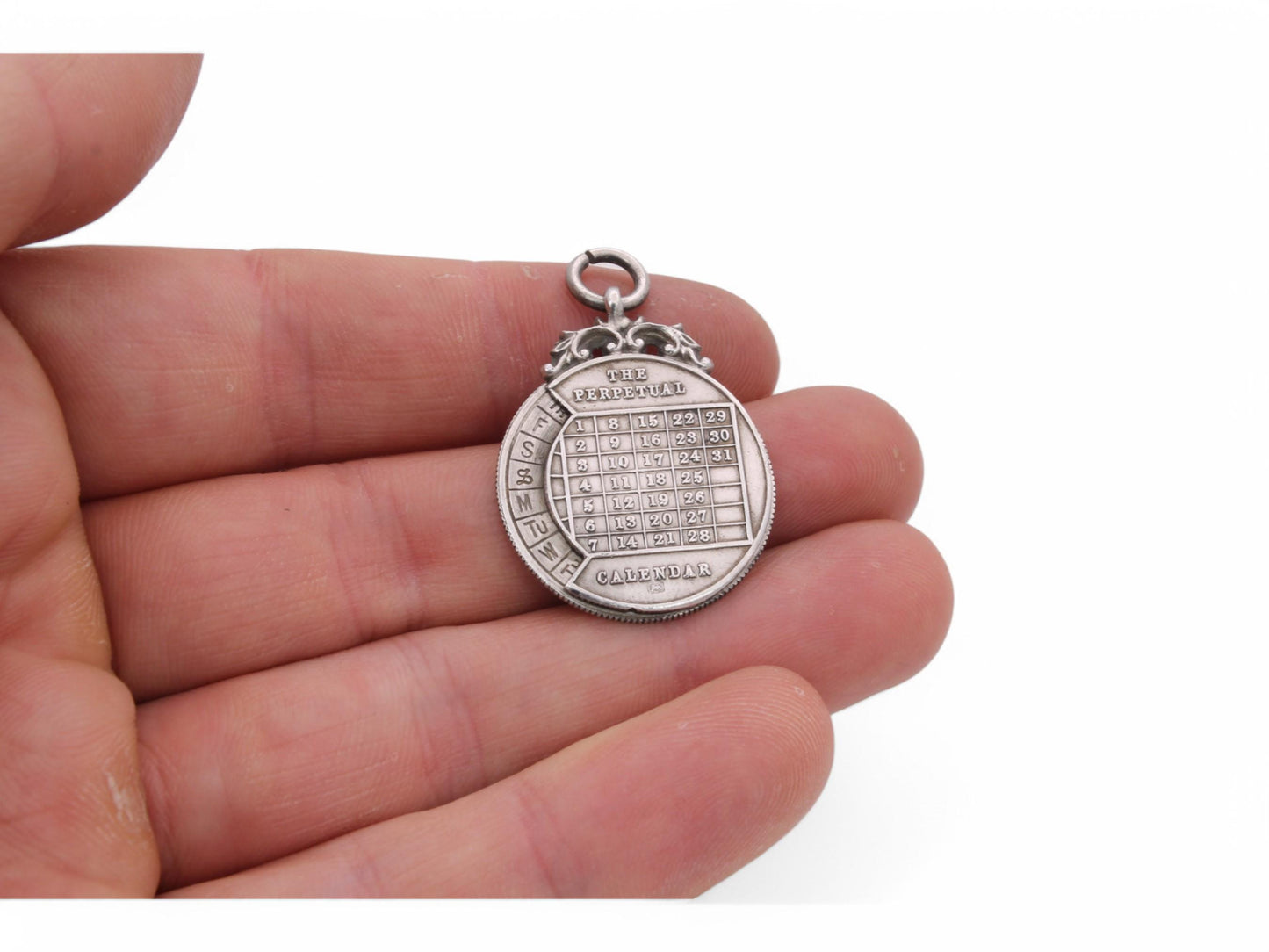 Antique Sterling Silver 'The Perpetual Calendar' Pendant