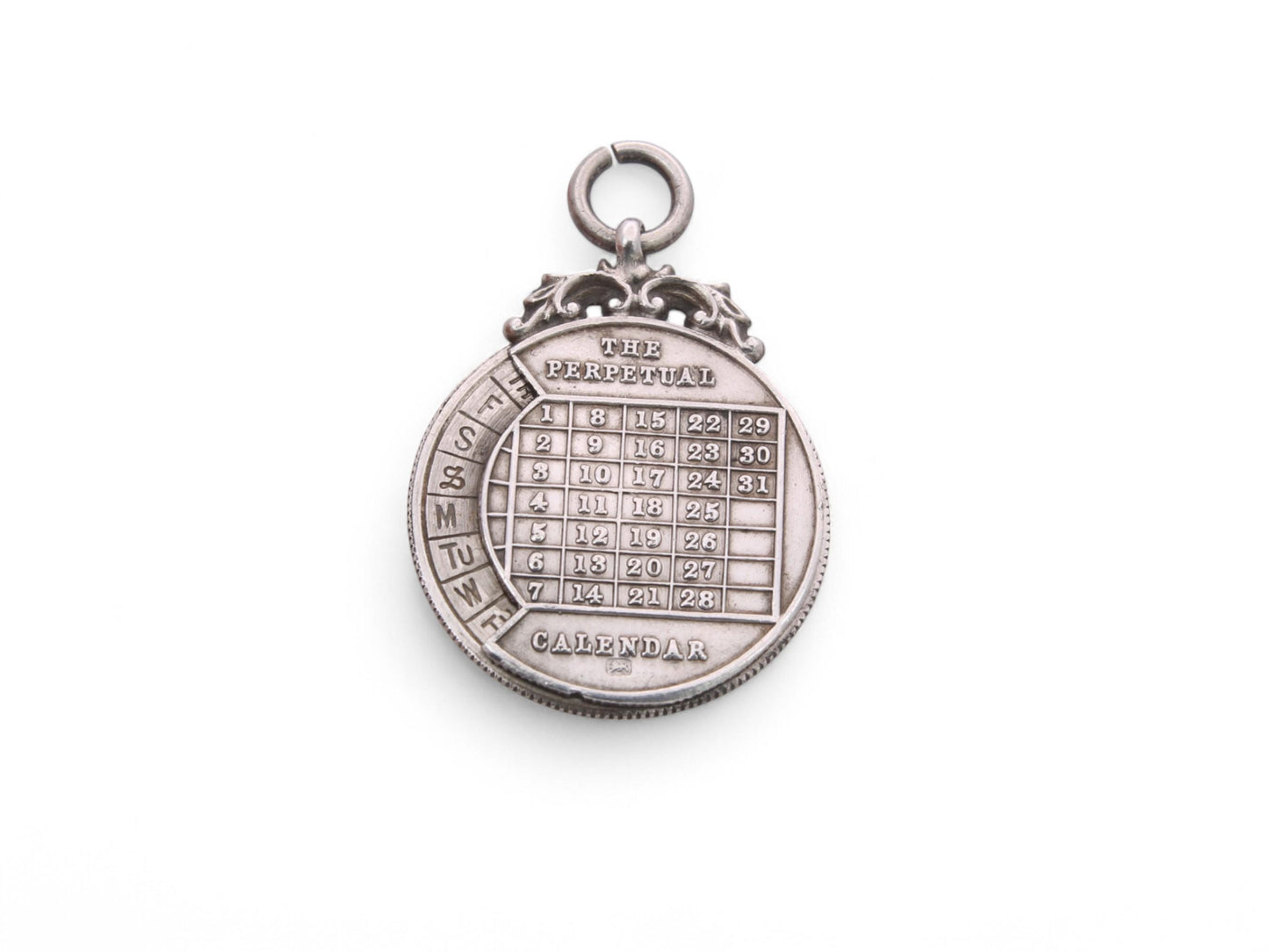 Antique Sterling Silver 'The Perpetual Calendar' Pendant