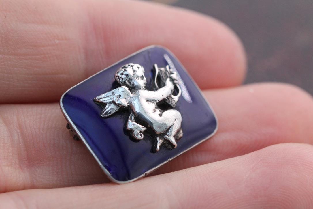 Antique-Sterling-Silver-Blue-Enamel-Cupid-Brooch