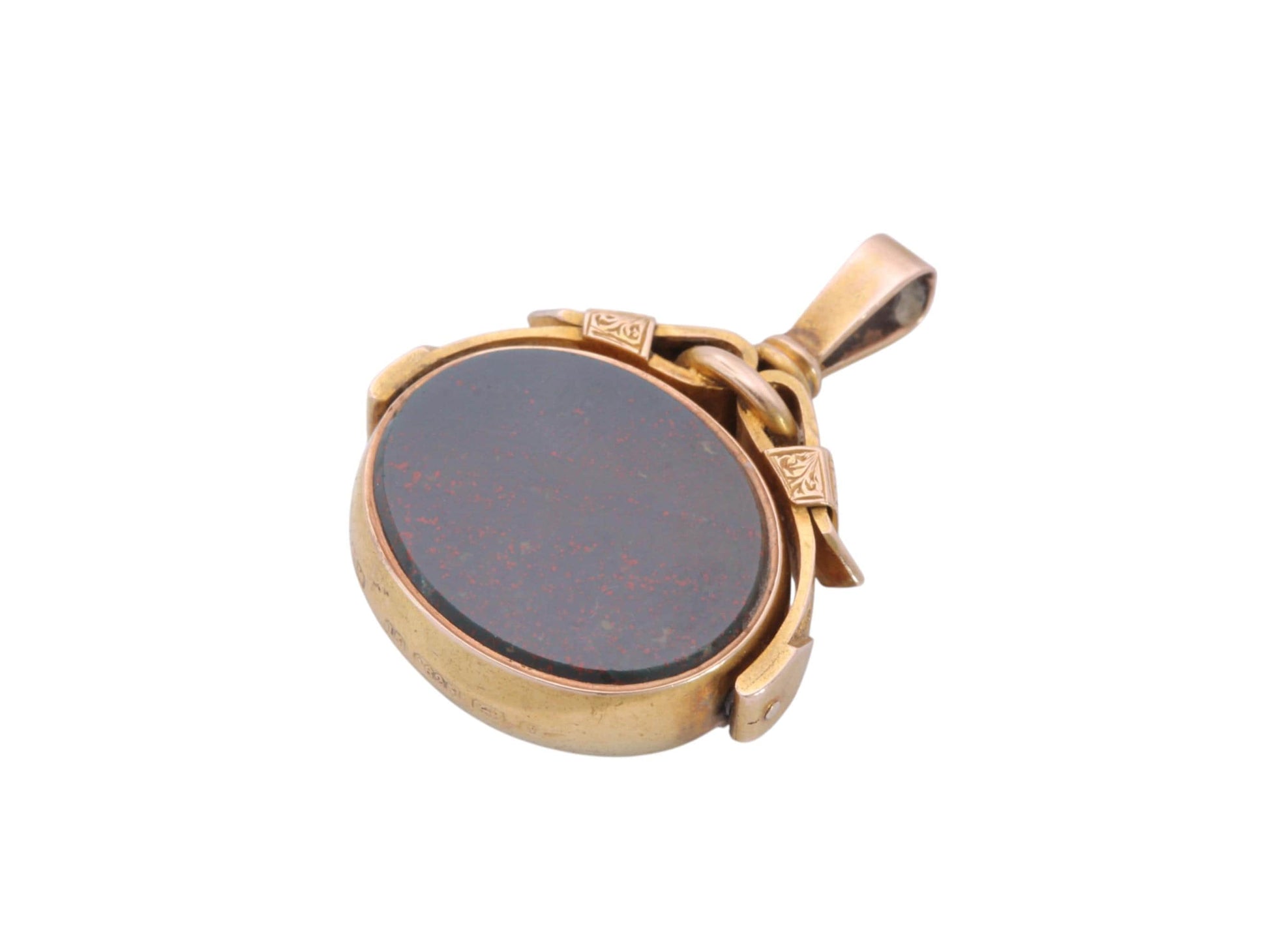 Side view of the 15ct gold spinner fob showing the rotating hardstone and engraved frame