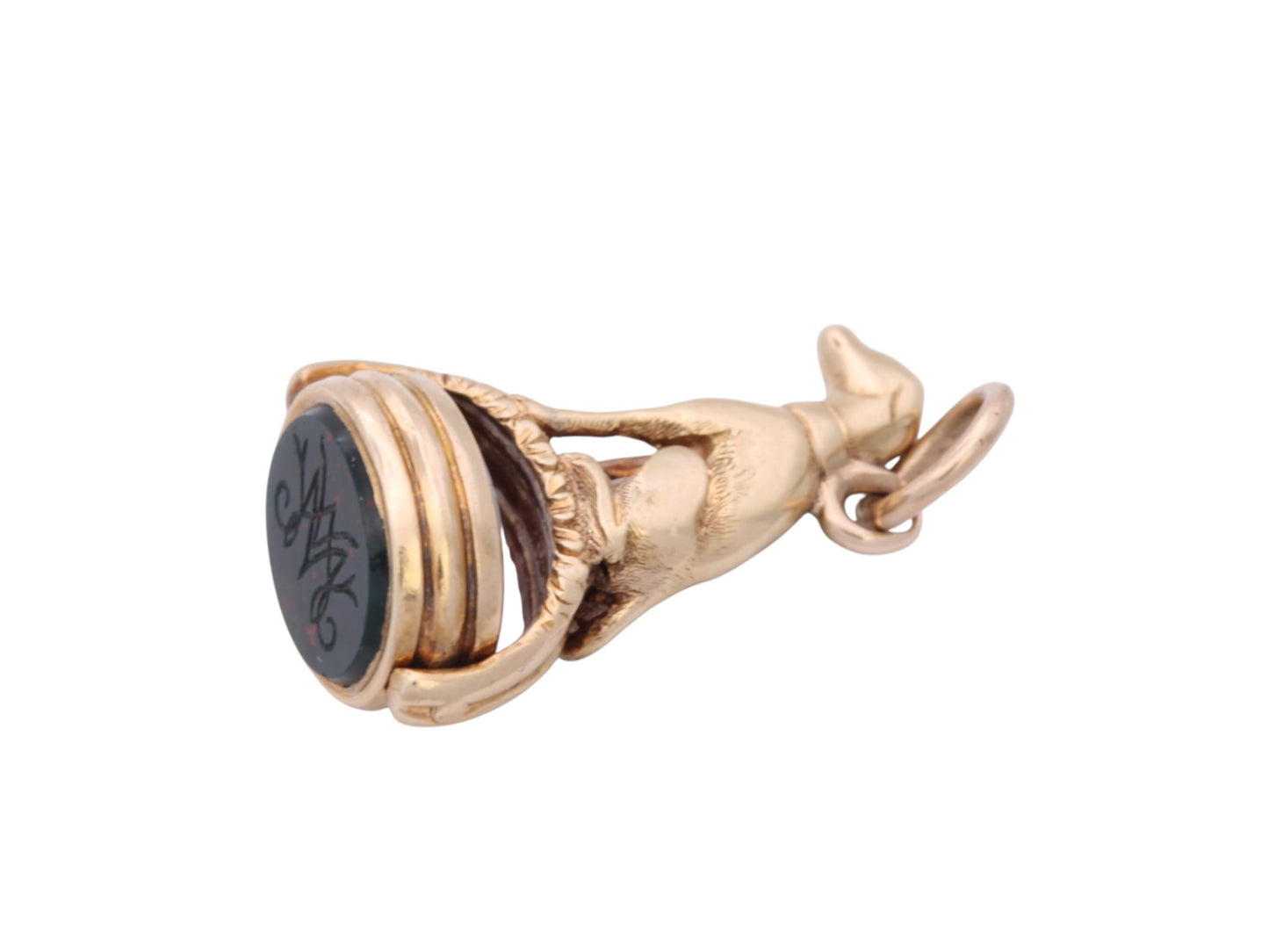 Antique gold spinner fob showing engraved bloodstone monogram