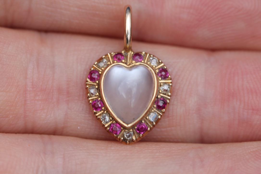 Victorian 15ct gold heart pendant set with moonstone, rubies and diamonds
