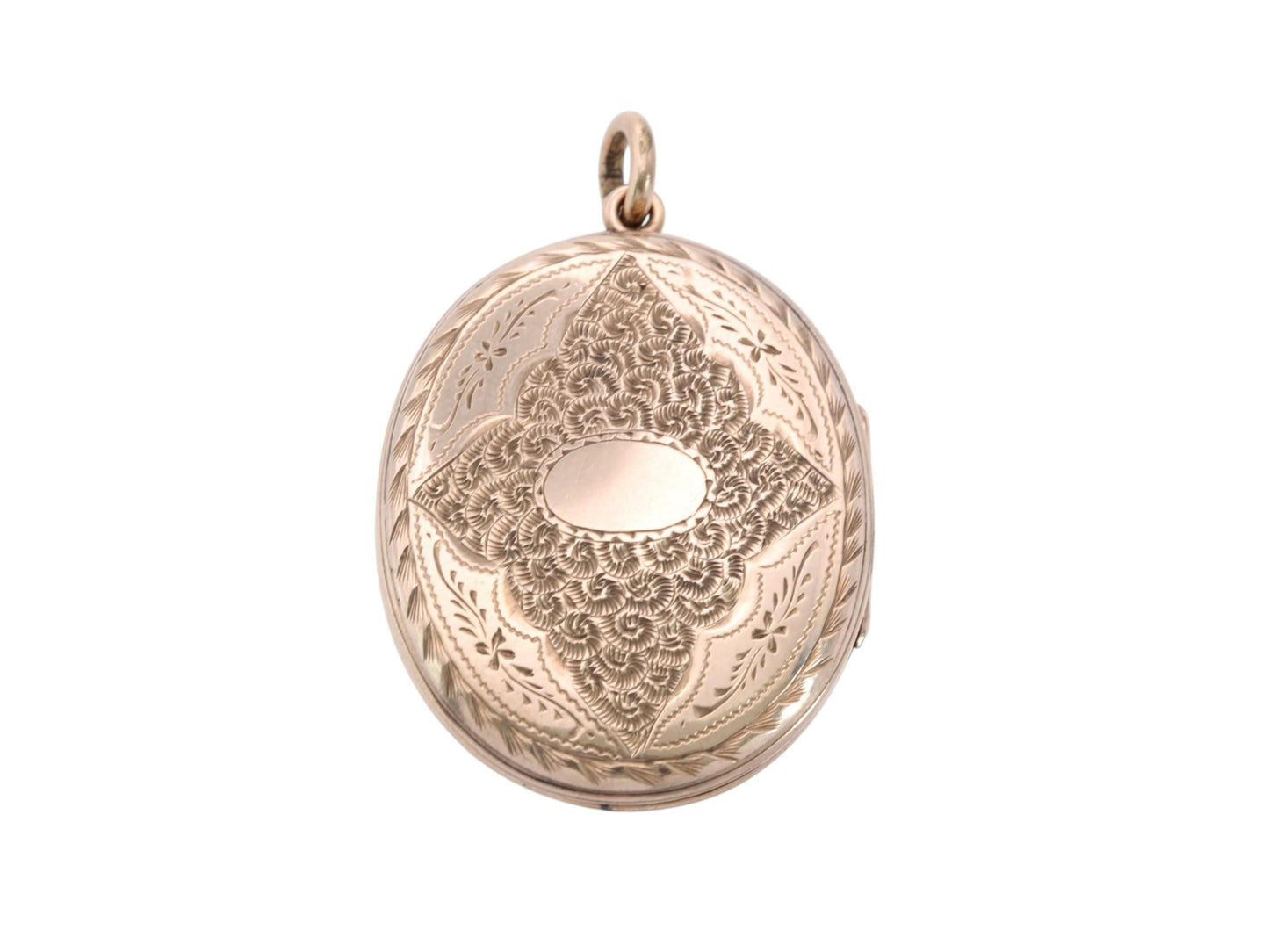 Reverse of Victorian 9ct gold locket with extensive hand engraved decoration