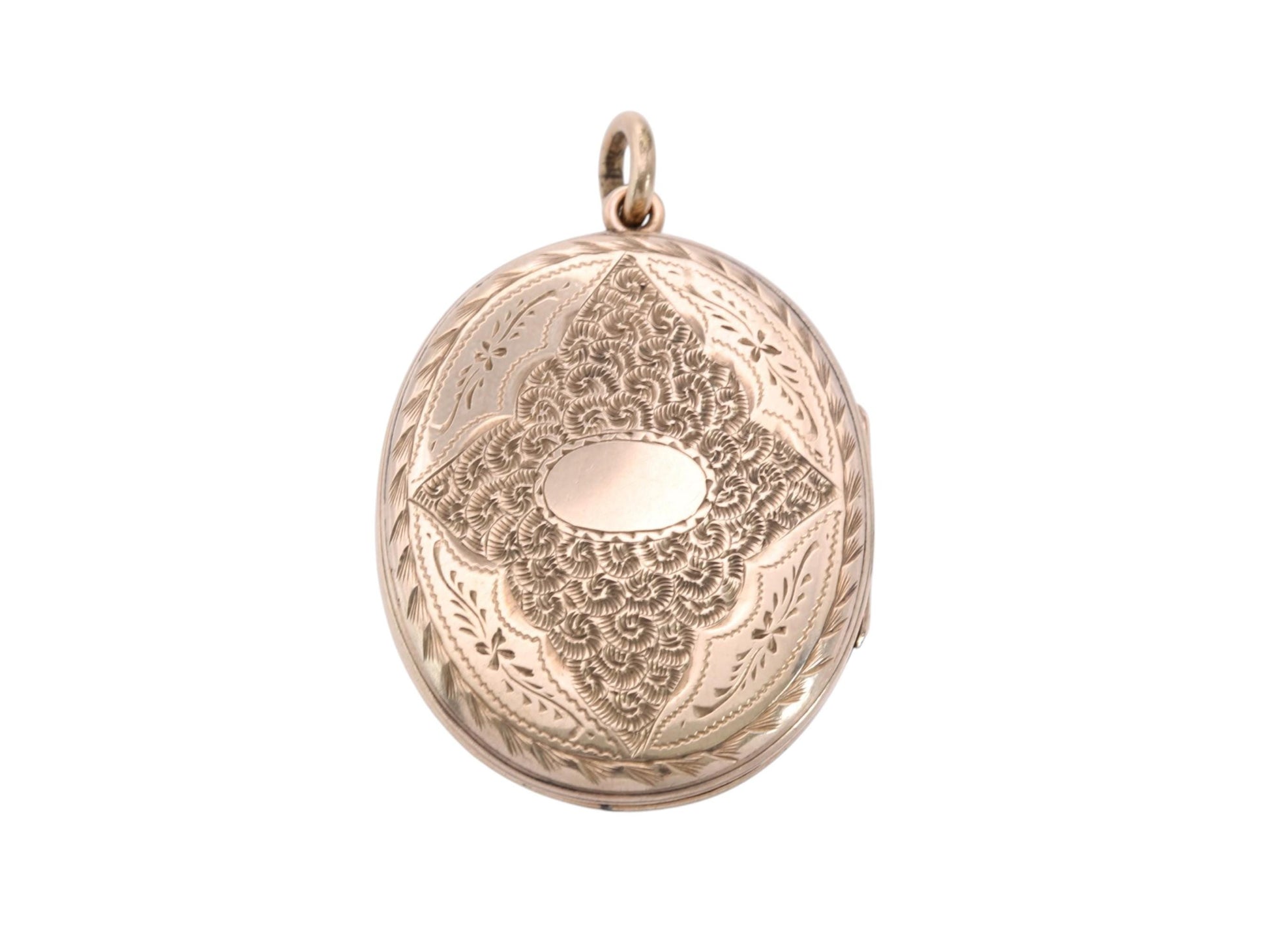 Reverse of Victorian 9ct gold locket with extensive hand engraved decoration