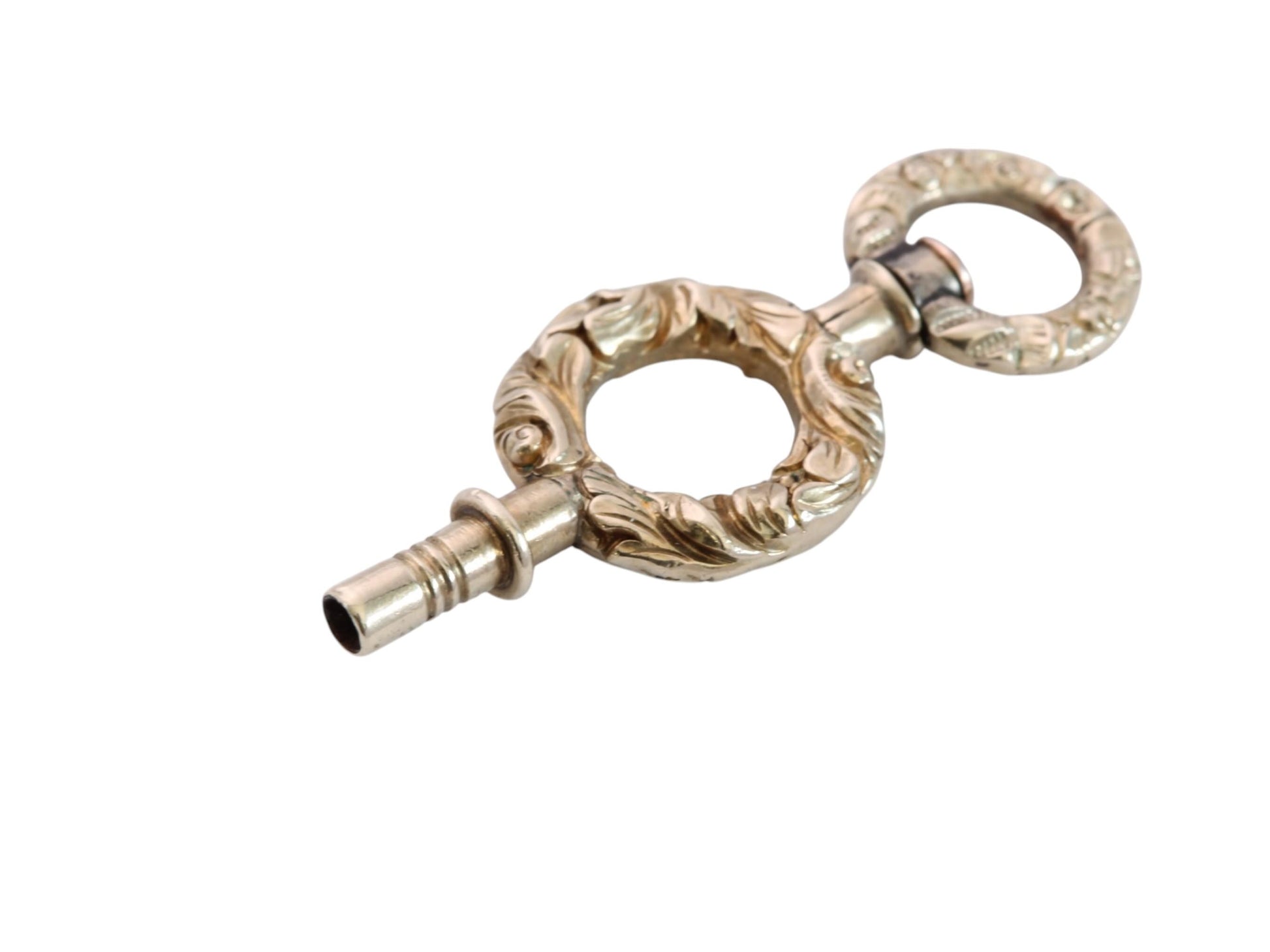 Base of antique gold filled watch key showing hollow winding socket