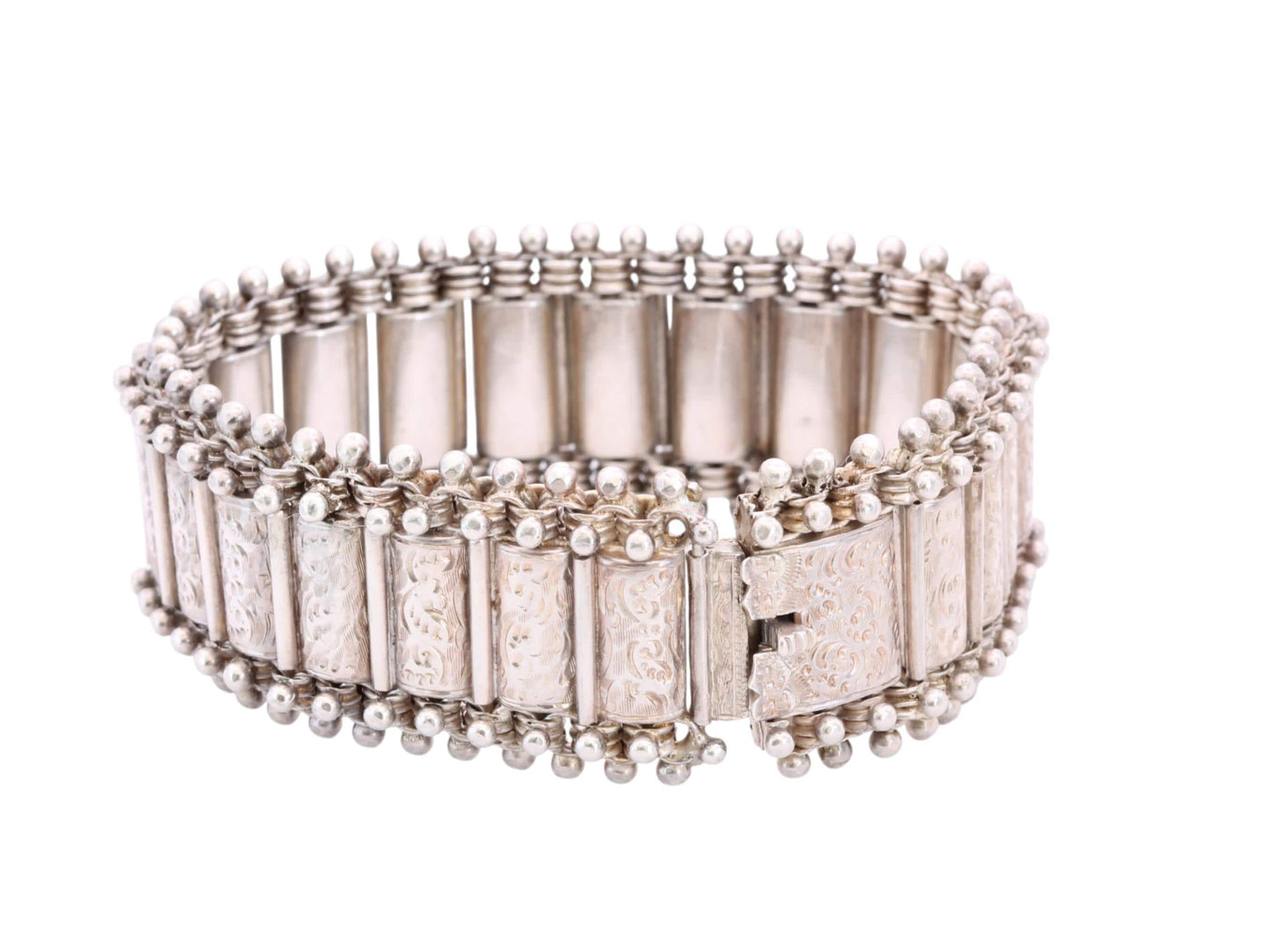 Victorian 1880 sterling silver bracelet with engraved articulated panels and beaded borders