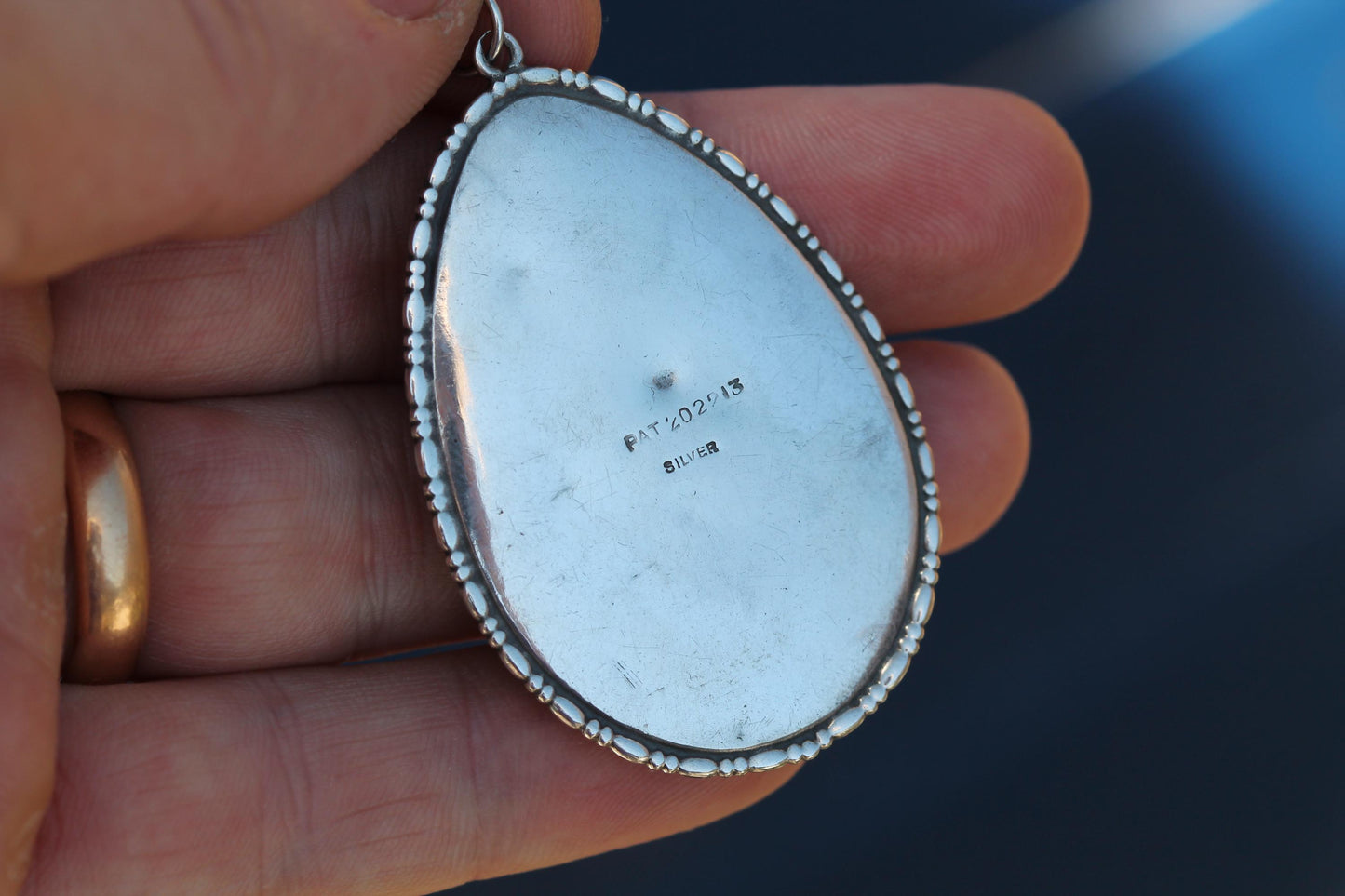 Art Deco sterling silver butterfly wing pendant with painted Indian scene