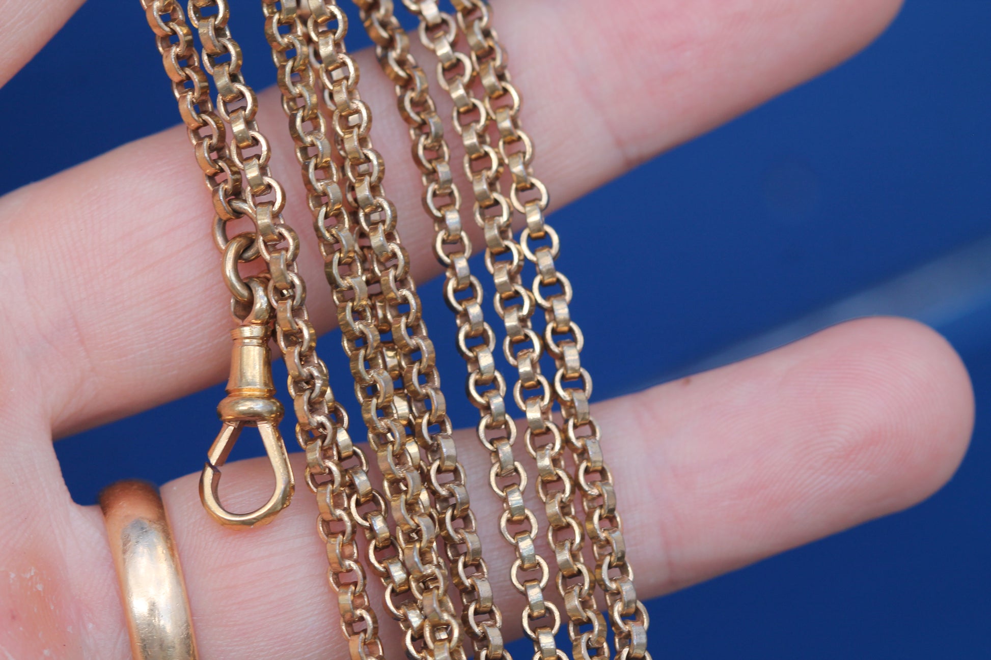 Antique 9ct rolled gold long guard chain showing original dog clip