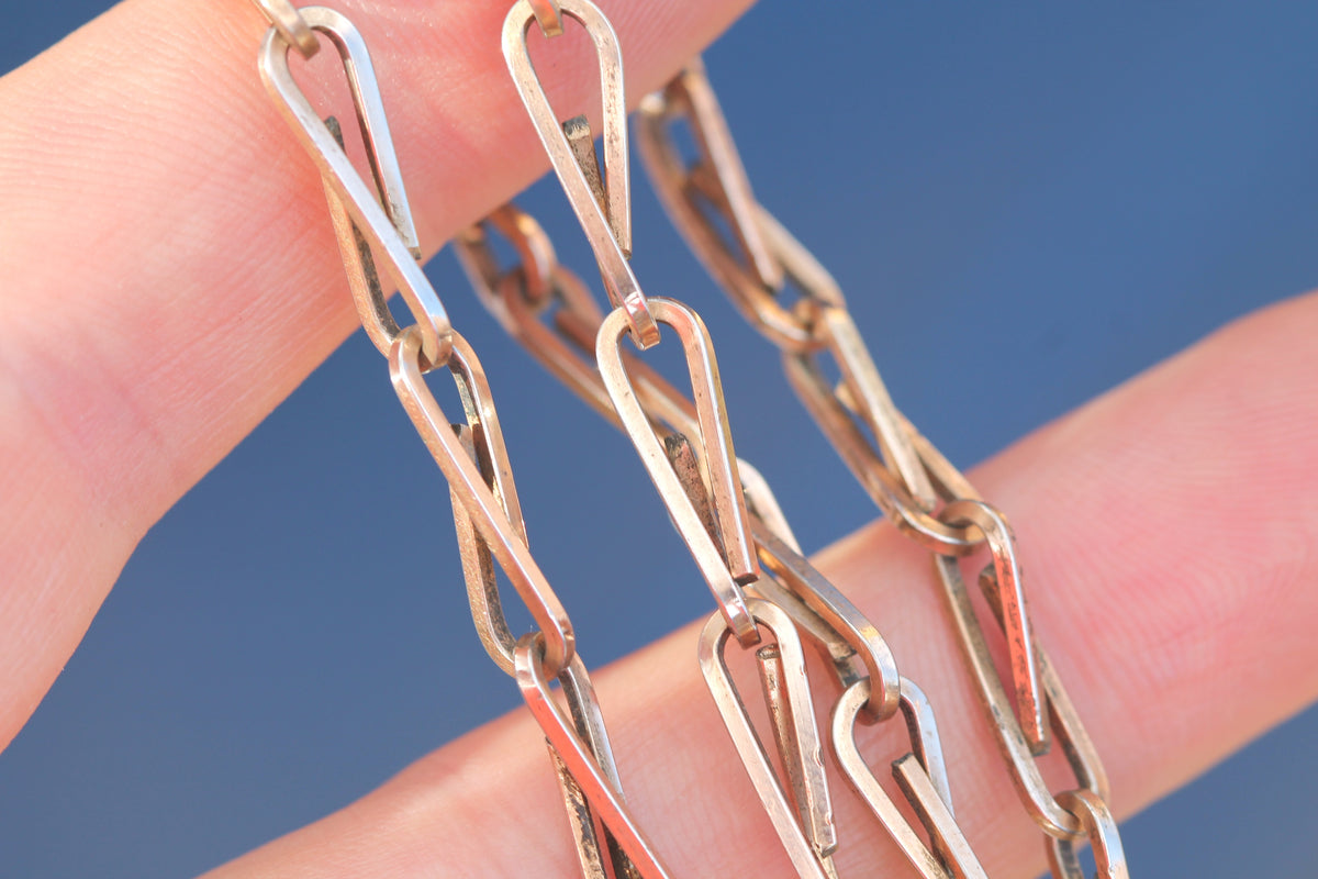 Antique rolled gold chain showing original period clasp