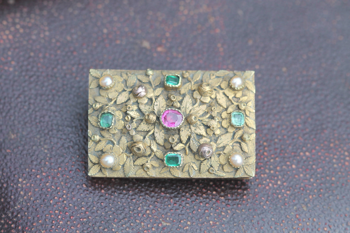 Reverse of antique brooch showing later conversion fittings