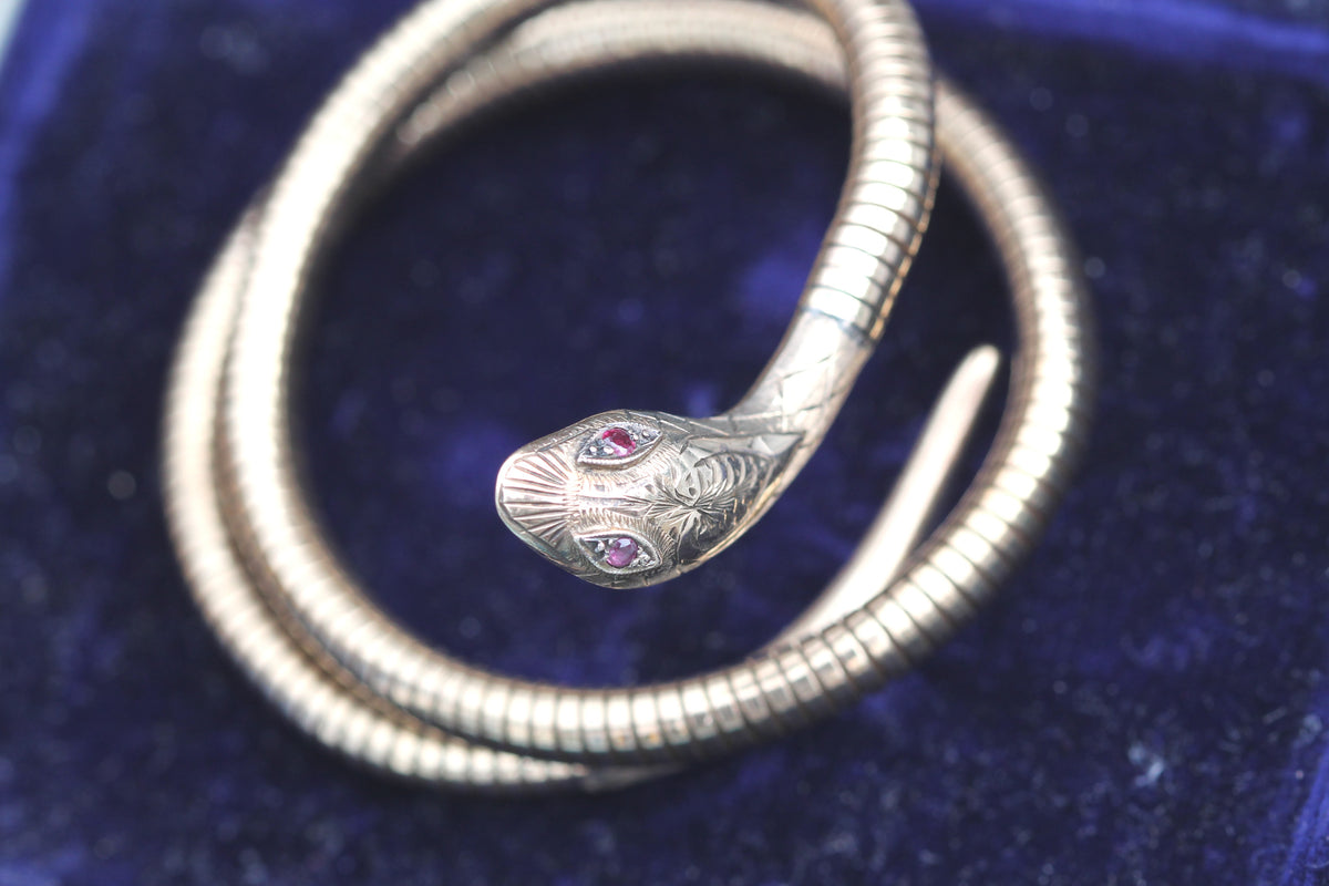 Full view of expandable coiled 9ct gold snake bangle