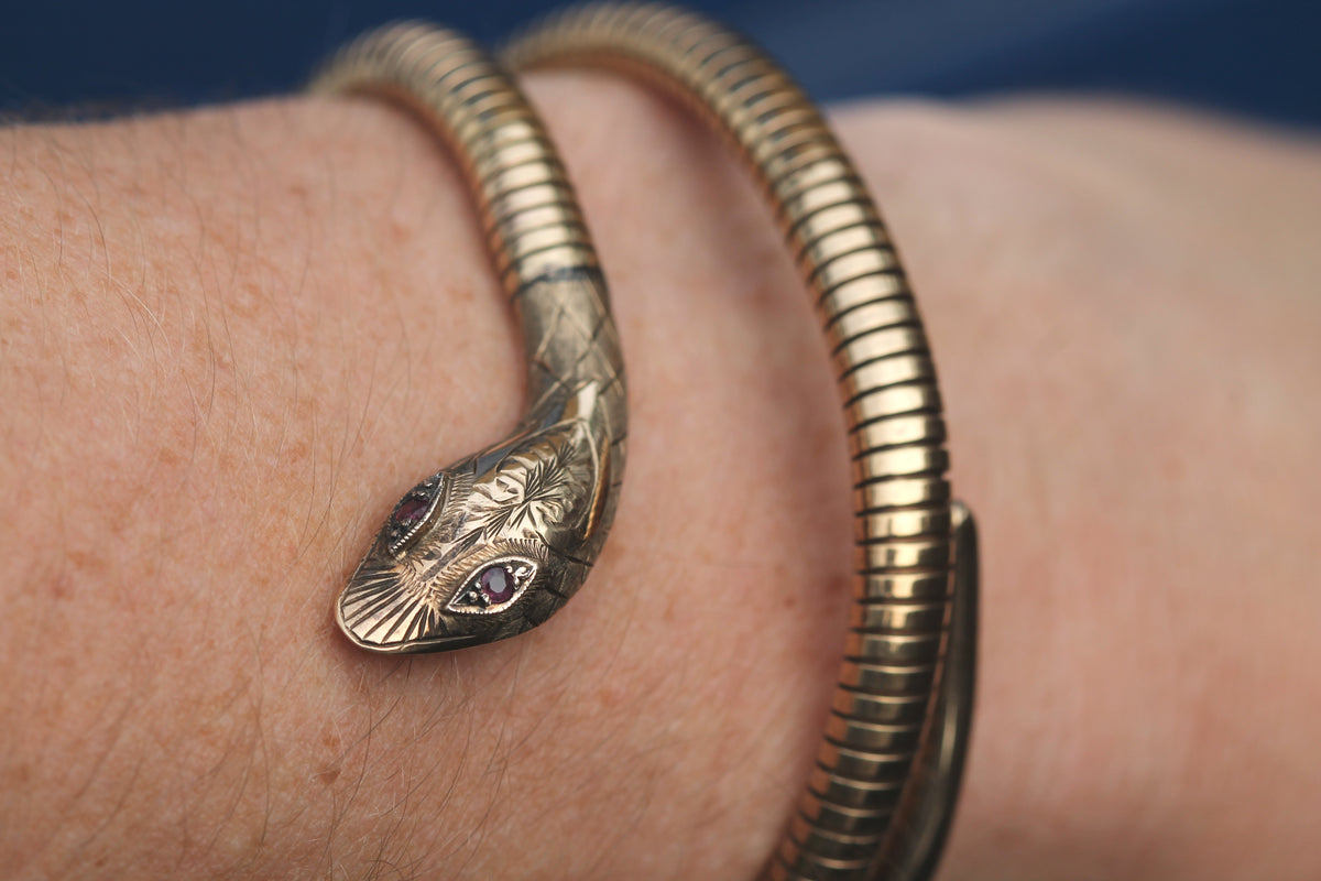 Vintage 1979 9ct gold expandable snake bangle with ruby eyes