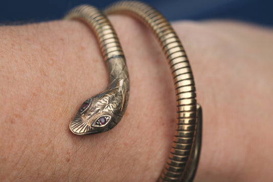 Vintage 1979 9ct gold expandable snake bangle with ruby eyes