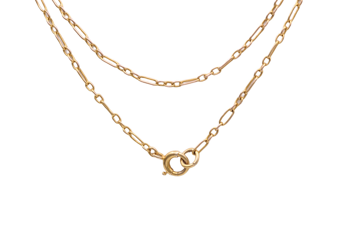 Close-up of fine antique trombone links in 9ct yellow gold