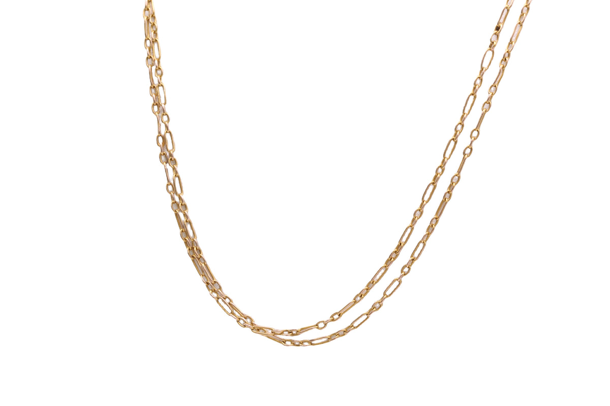 Antique 35 inch gold long guard chain showing spring ring clasp