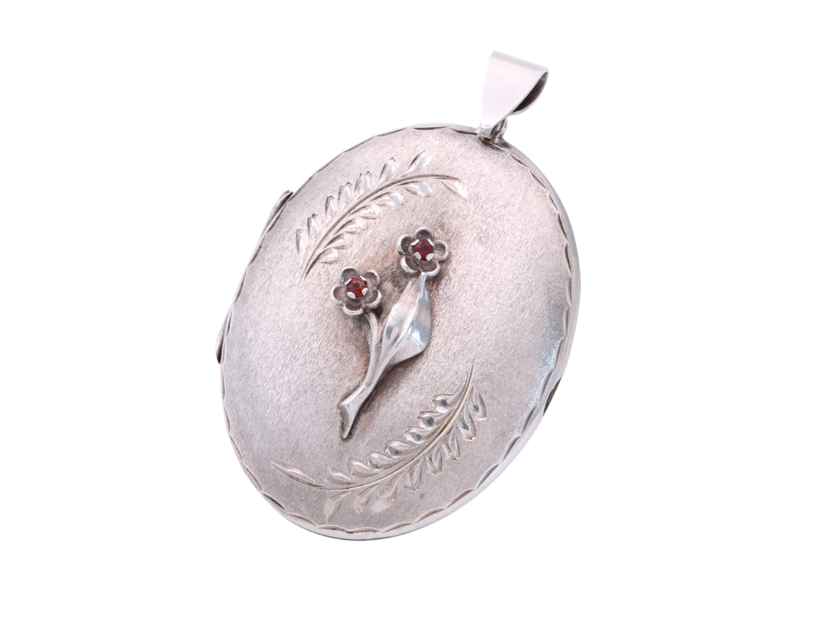 Reverse of 1975 sterling silver locket engraved Mizpah
