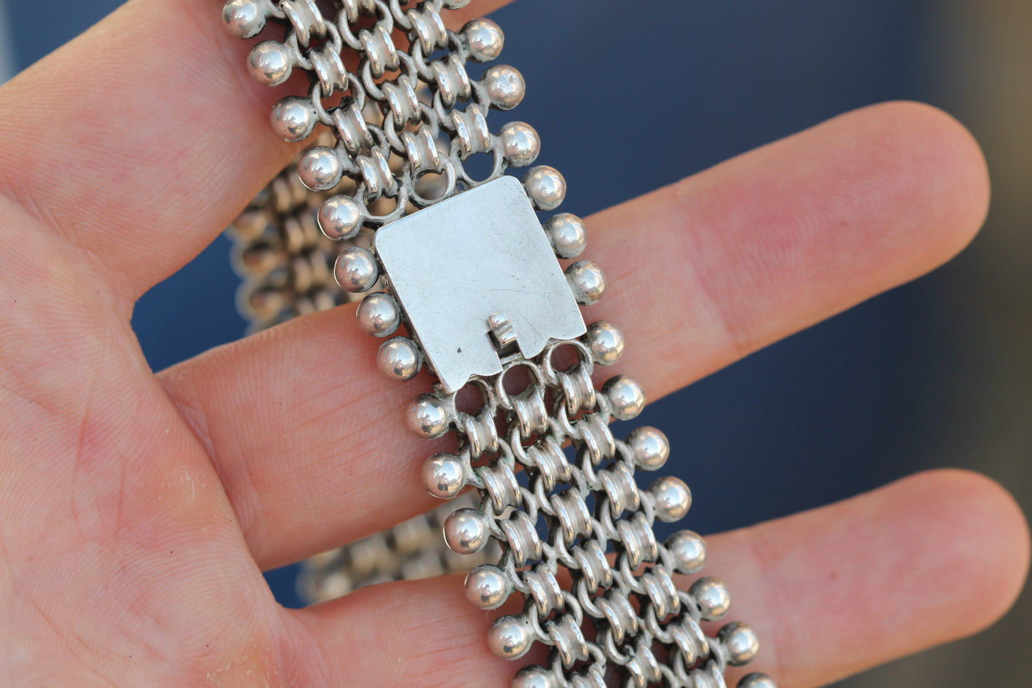 Antique silver collar showing articulated links, ball detail and concealed box clasp