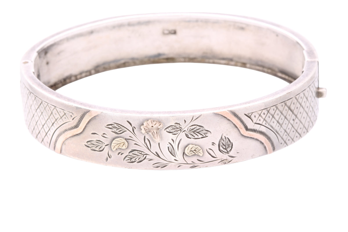 Antique Victorian sterling silver bangle with 9ct rose and green gold floral highlights