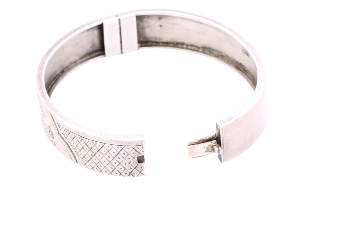 Interior of Victorian sterling silver bangle showing Birmingham 1883 hallmarks