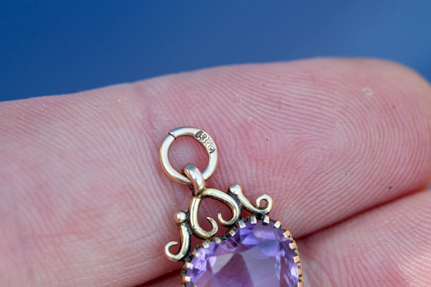 Reverse of Edwardian 9ct gold amethyst heart pendant showing open back