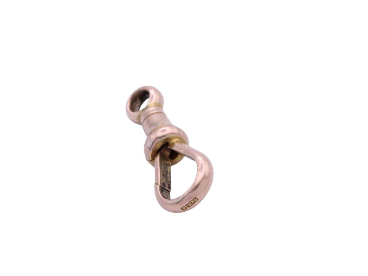 Antique 9ct rose gold dog clip clasp showing spring opening
