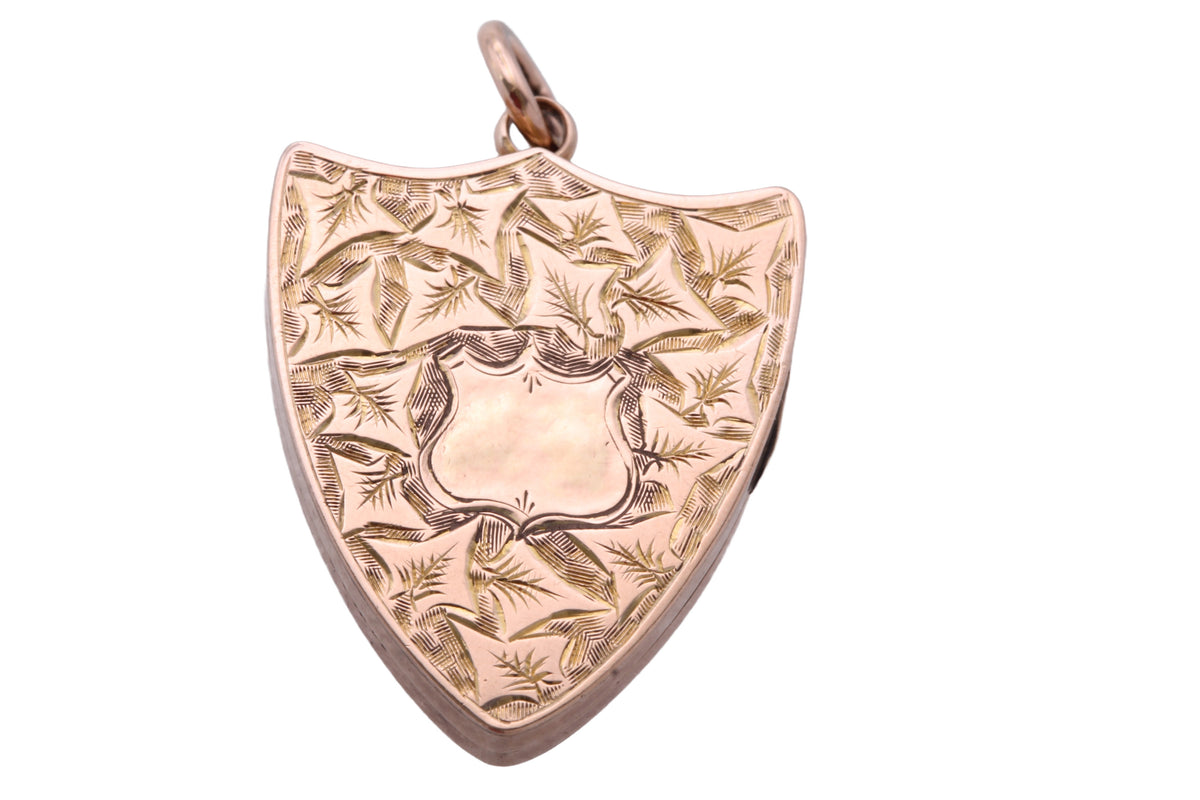 Antique Edwardian 9ct gold shield locket with chased foliate decoration