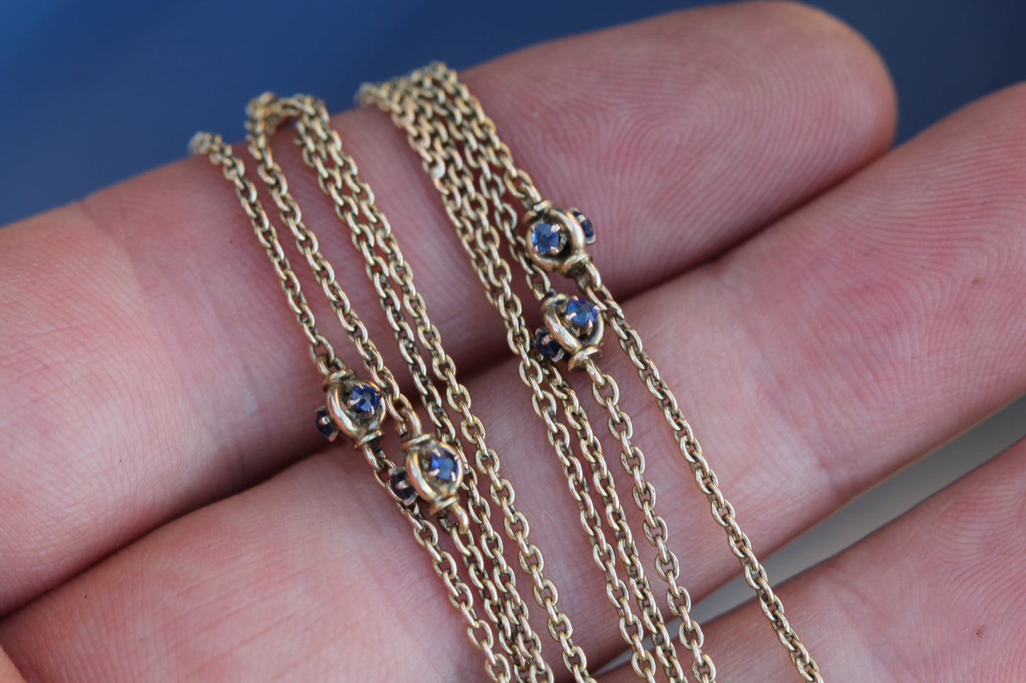 Antique 14ct gold long guard chain with sapphire-set stations