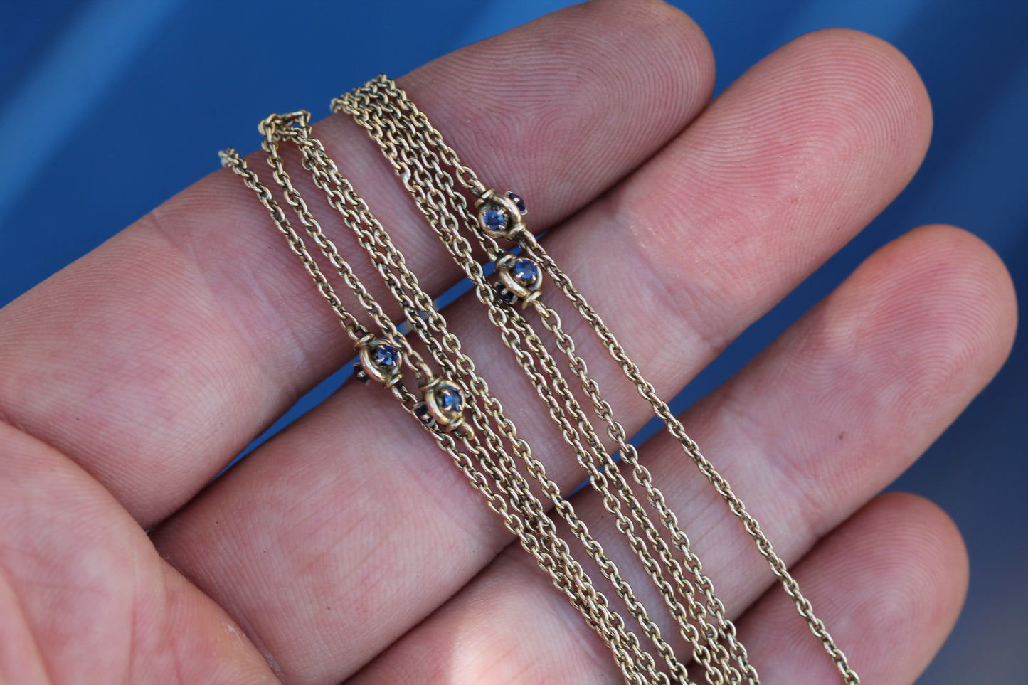 Close-up of the original clasp on an antique 14ct gold long guard chain