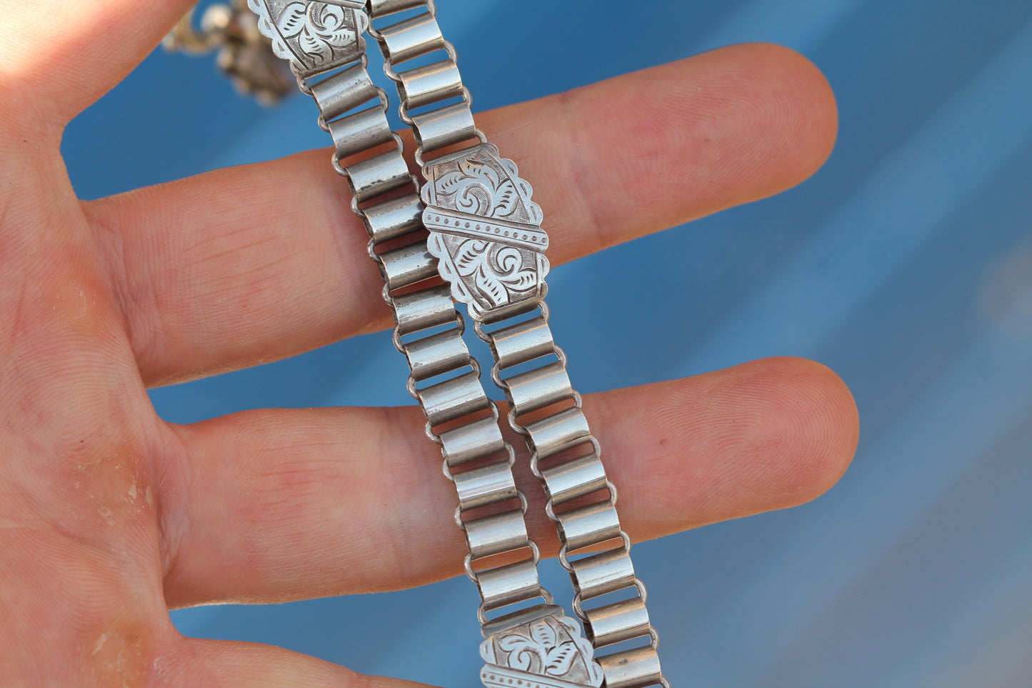 Antique Victorian sterling silver book chain necklace with engraved panels