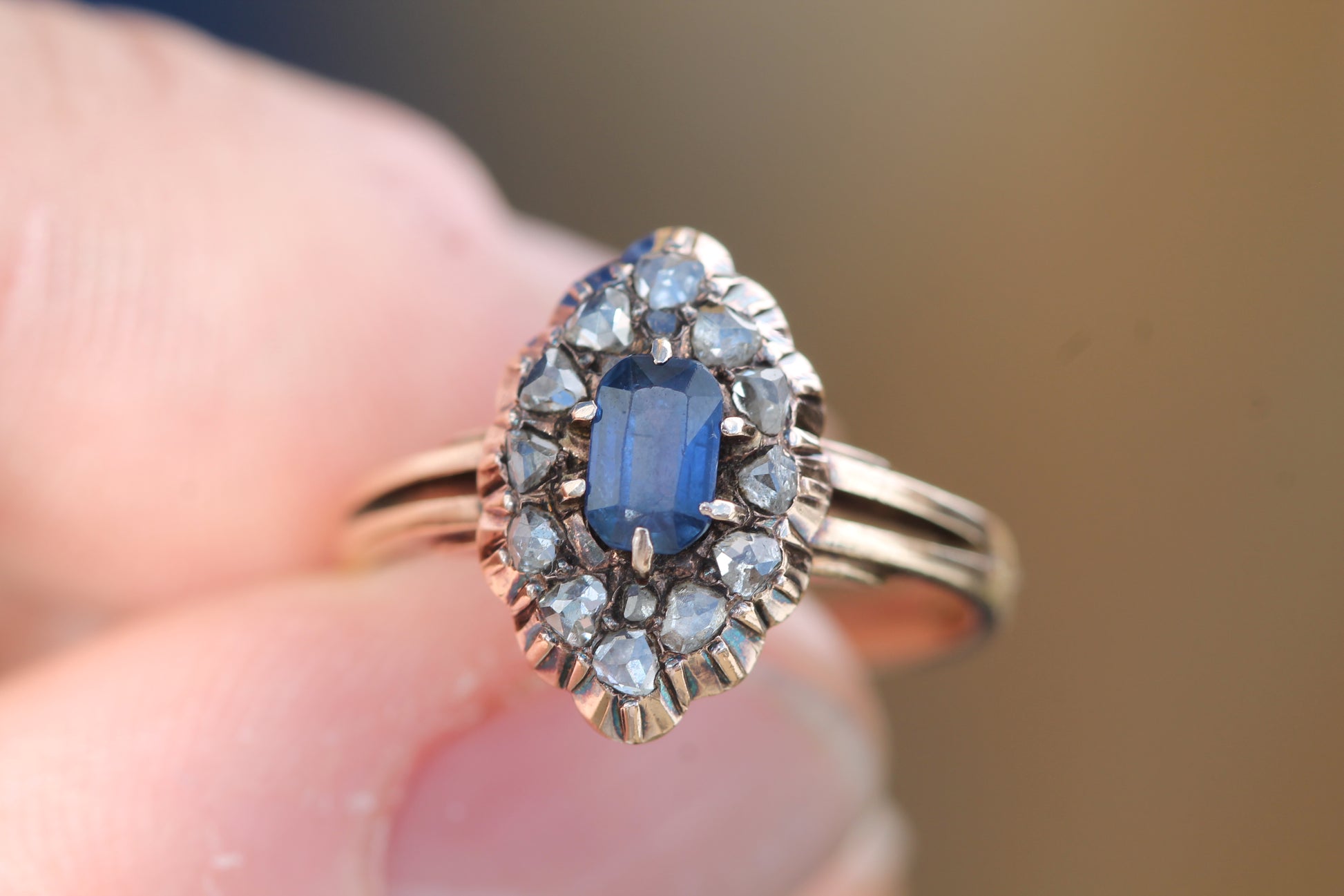 Late 19th century sapphire diamond navette ring worn on the finger