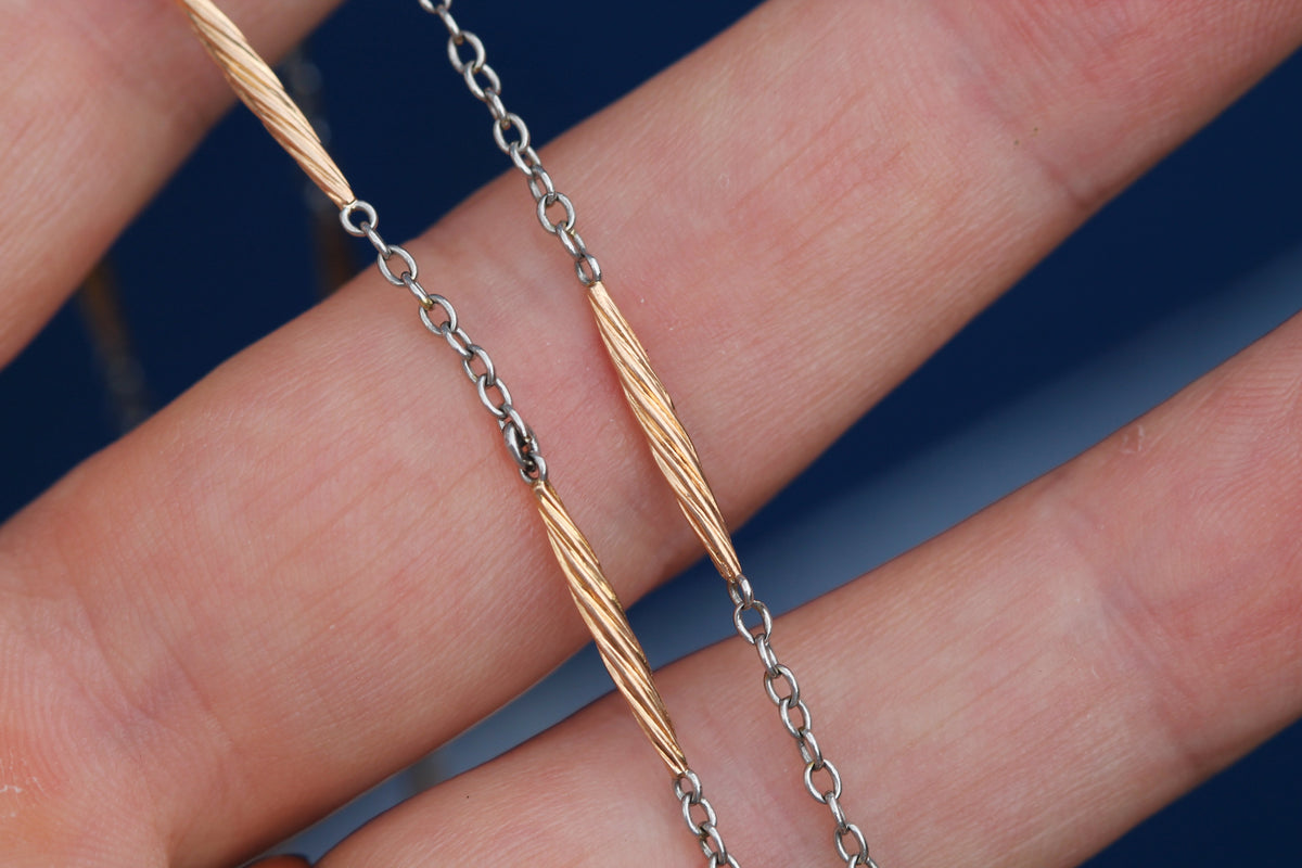 Close-up of antique two-tone gold and platinum necklace clasp