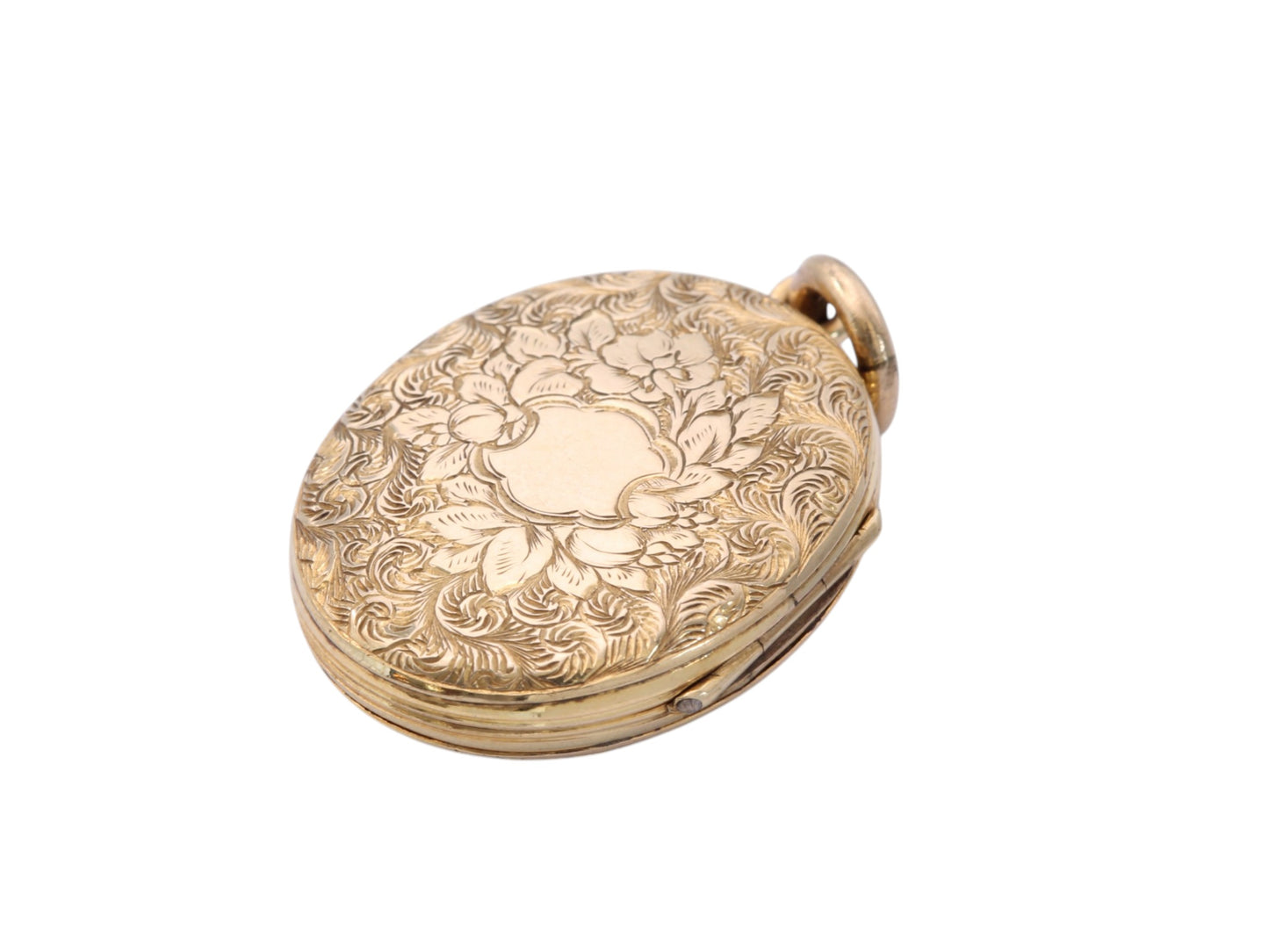 Reverse of antique 9ct gold back and front locket with floral engraving