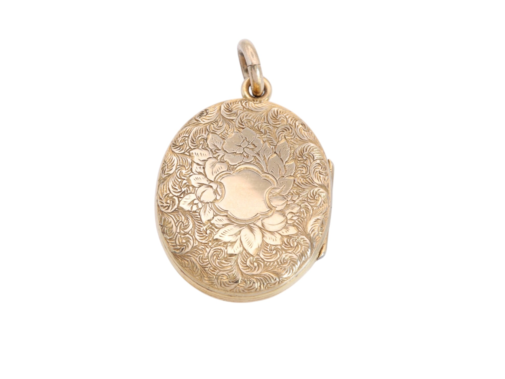 Open Victorian enamel locket showing original internal glass panels