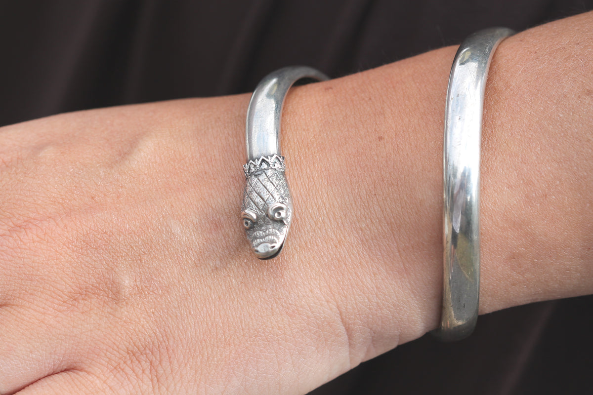 Detailed view of Victorian sterling silver snake head and engraved scales