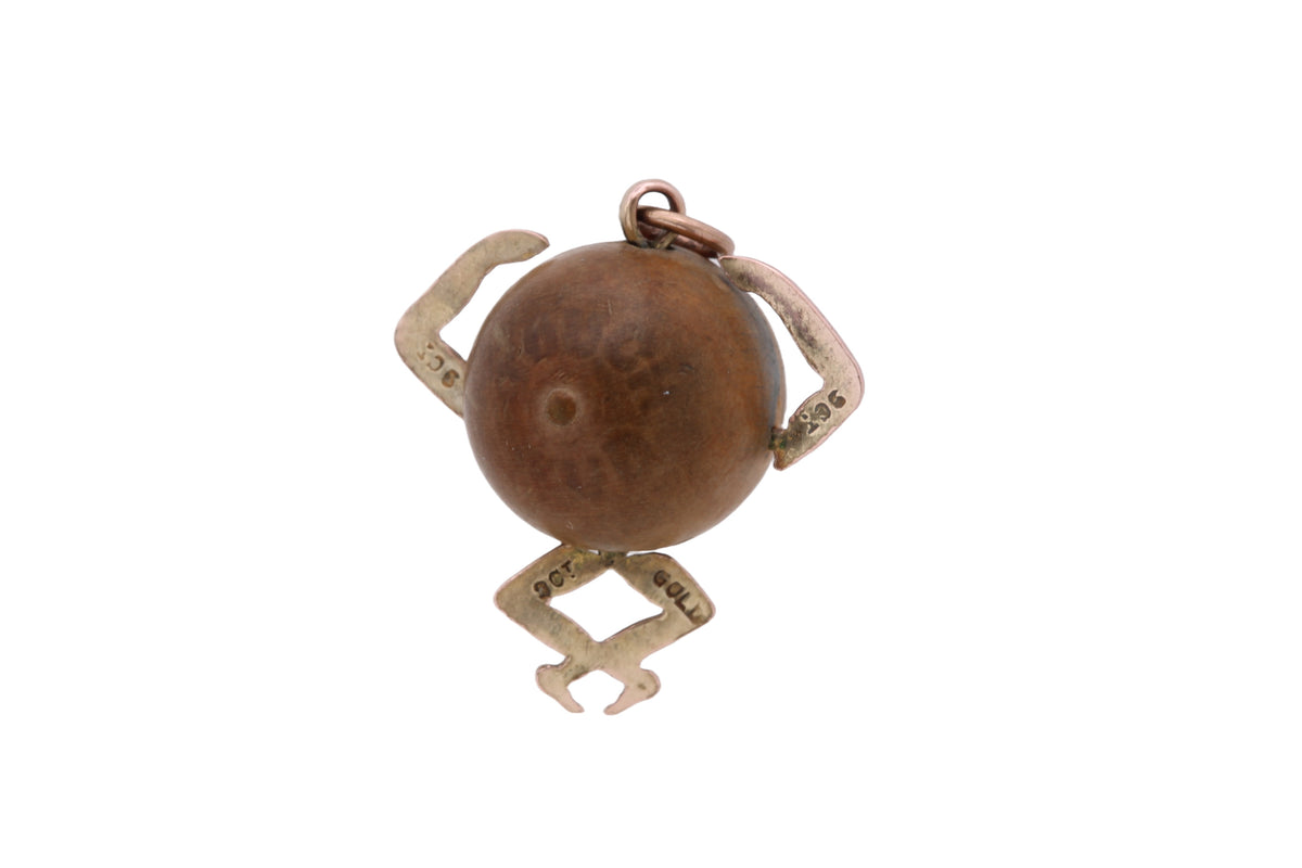 Reverse of WWI Touch Wud charm showing 9CT stamps and period lettering