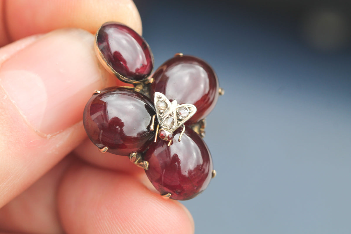 Reverse of Victorian 9ct gold garnet and insect pendant