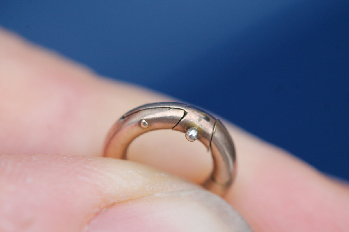 Antique 9ct gold spring ring clasp shown close up