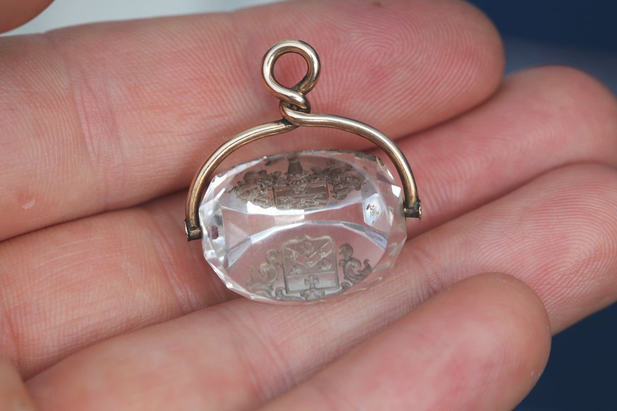 Reverse view of antique rock crystal spinner showing faceted crystal