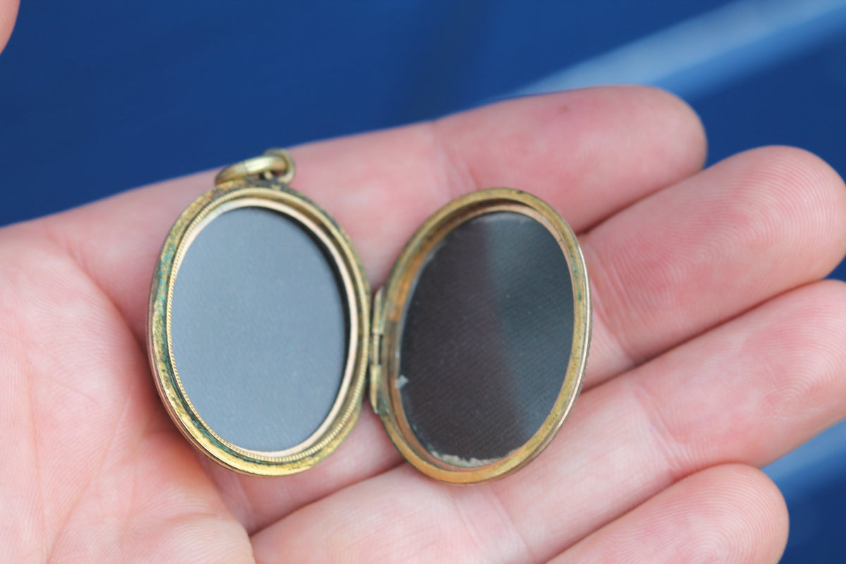 Antique Victorian 9ct gold back and front locket with floral enamel