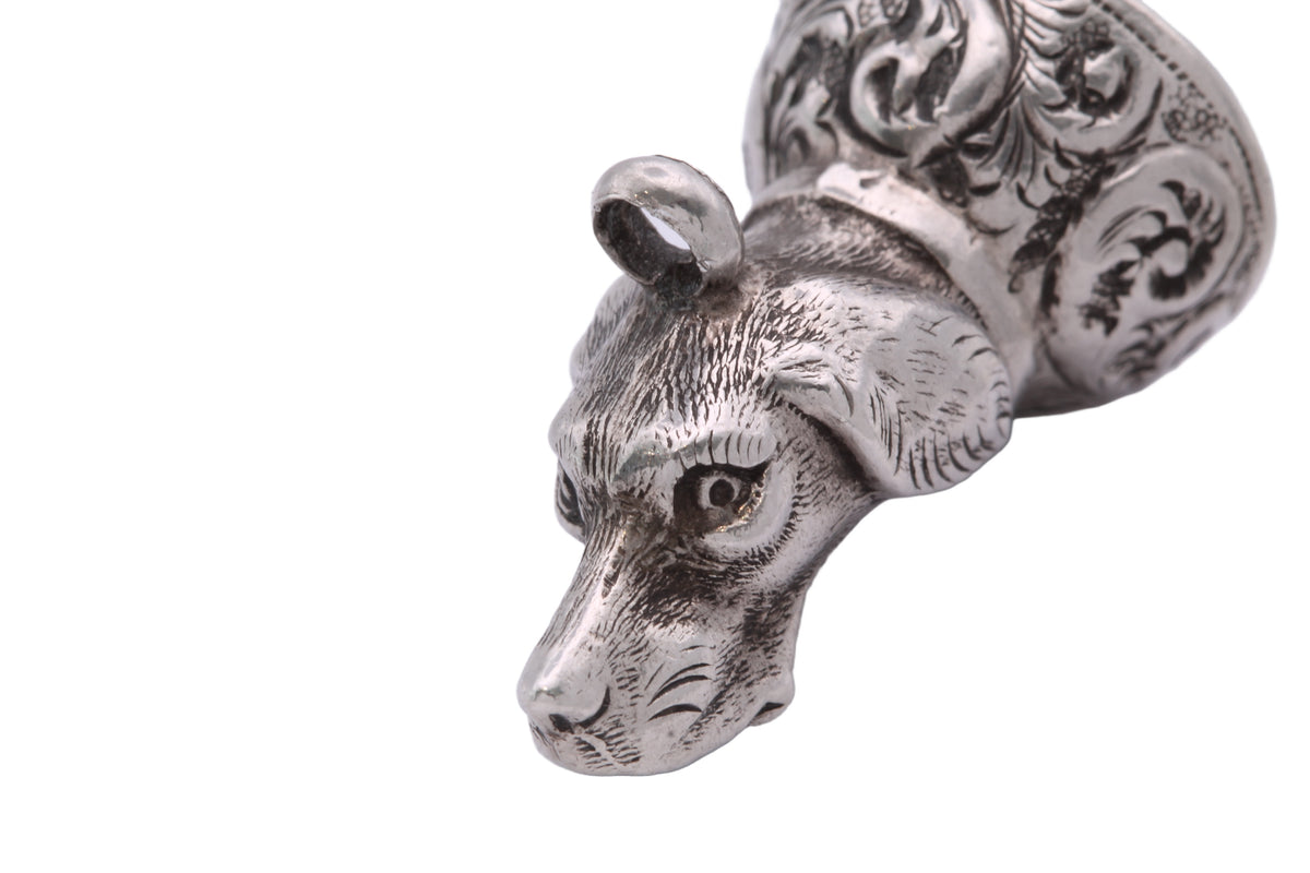 Circular carnelian base on antique Victorian silver seal fob