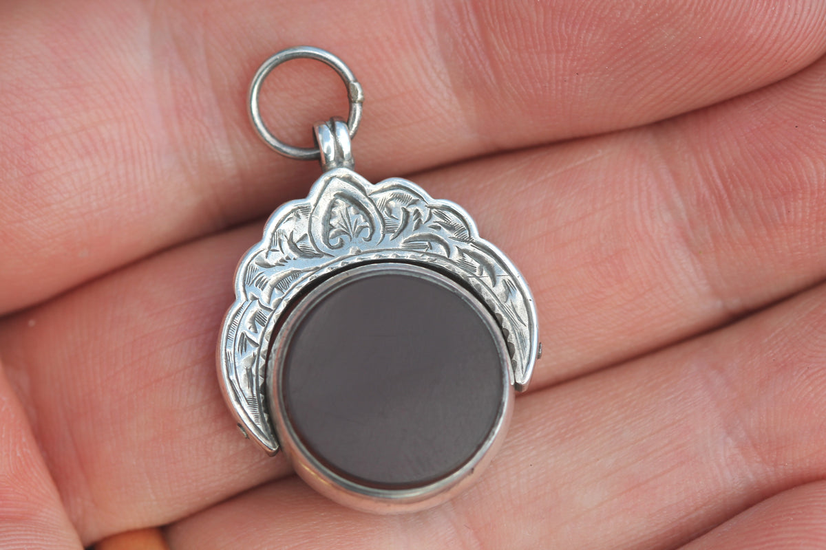 Side view of Victorian spinner fob showing rotating stone setting