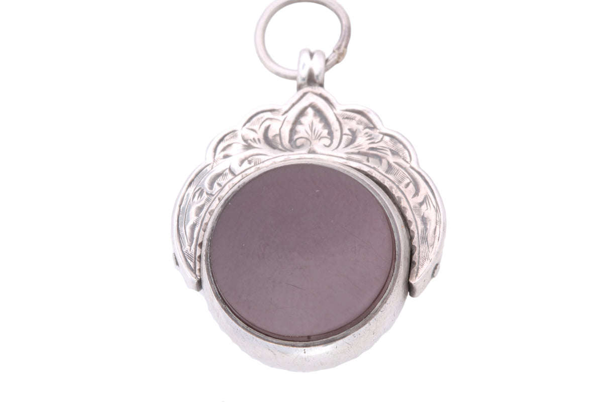 Bloodstone side of Victorian silver spinner fob with engraved surround