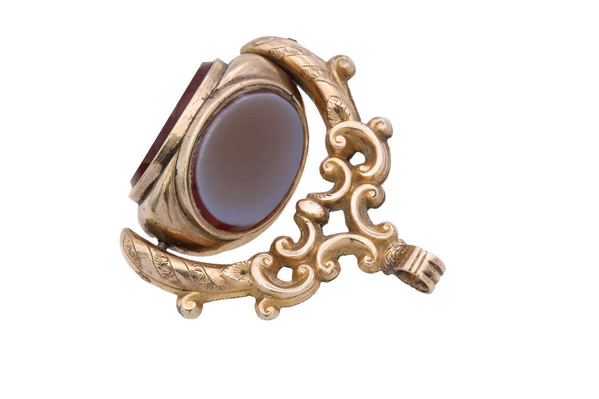 Close-up of oval agate face on Victorian military spinner fob