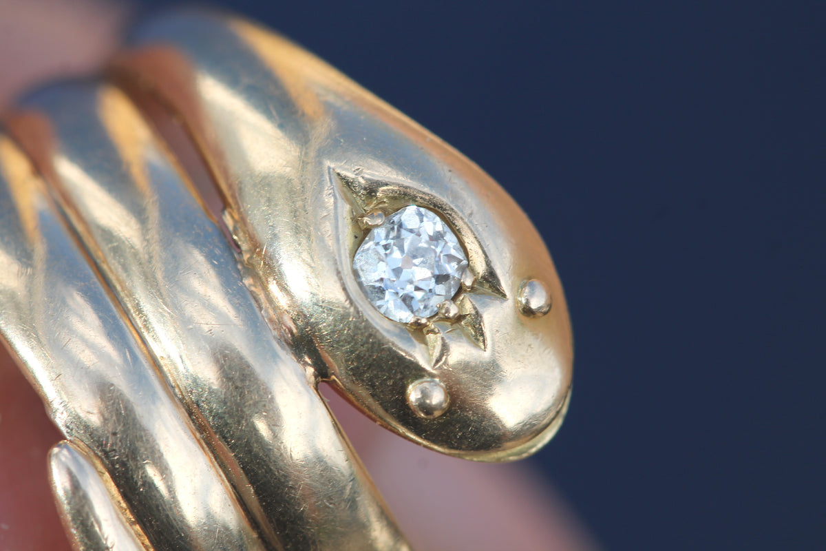 Interior of Victorian gold snake ring showing Birmingham 1898 hallmarks