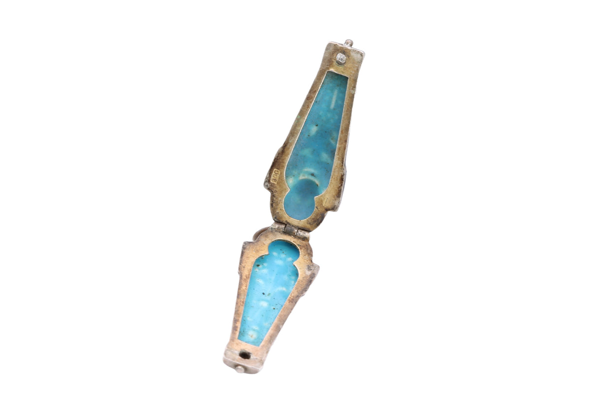 Open 800 silver sarcophagus pendant showing blue enamelled interior