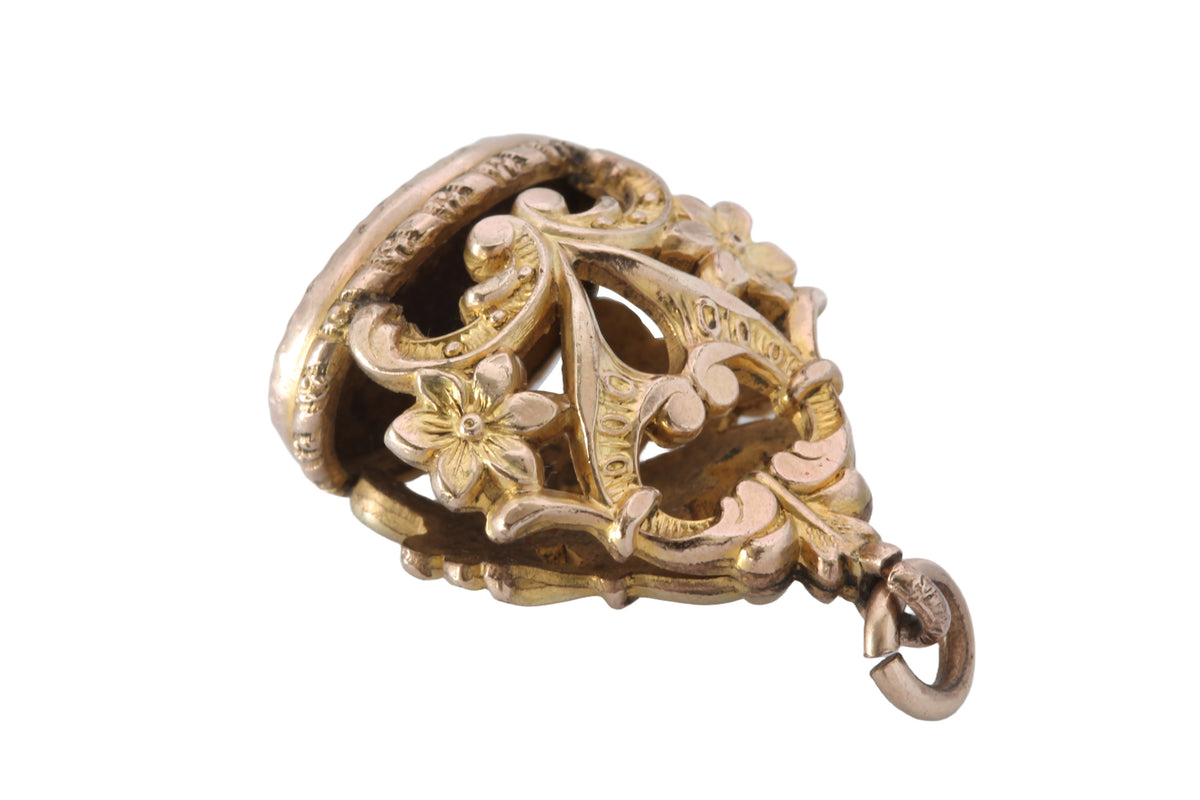 Base of antique rolled gold fob with rope-style border