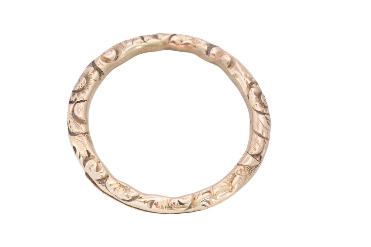 Close-up of hand-chased decoration on Georgian gold split ring