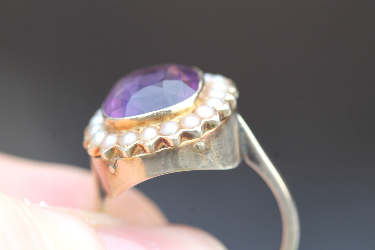 Side view showing raised antique amethyst cluster setting