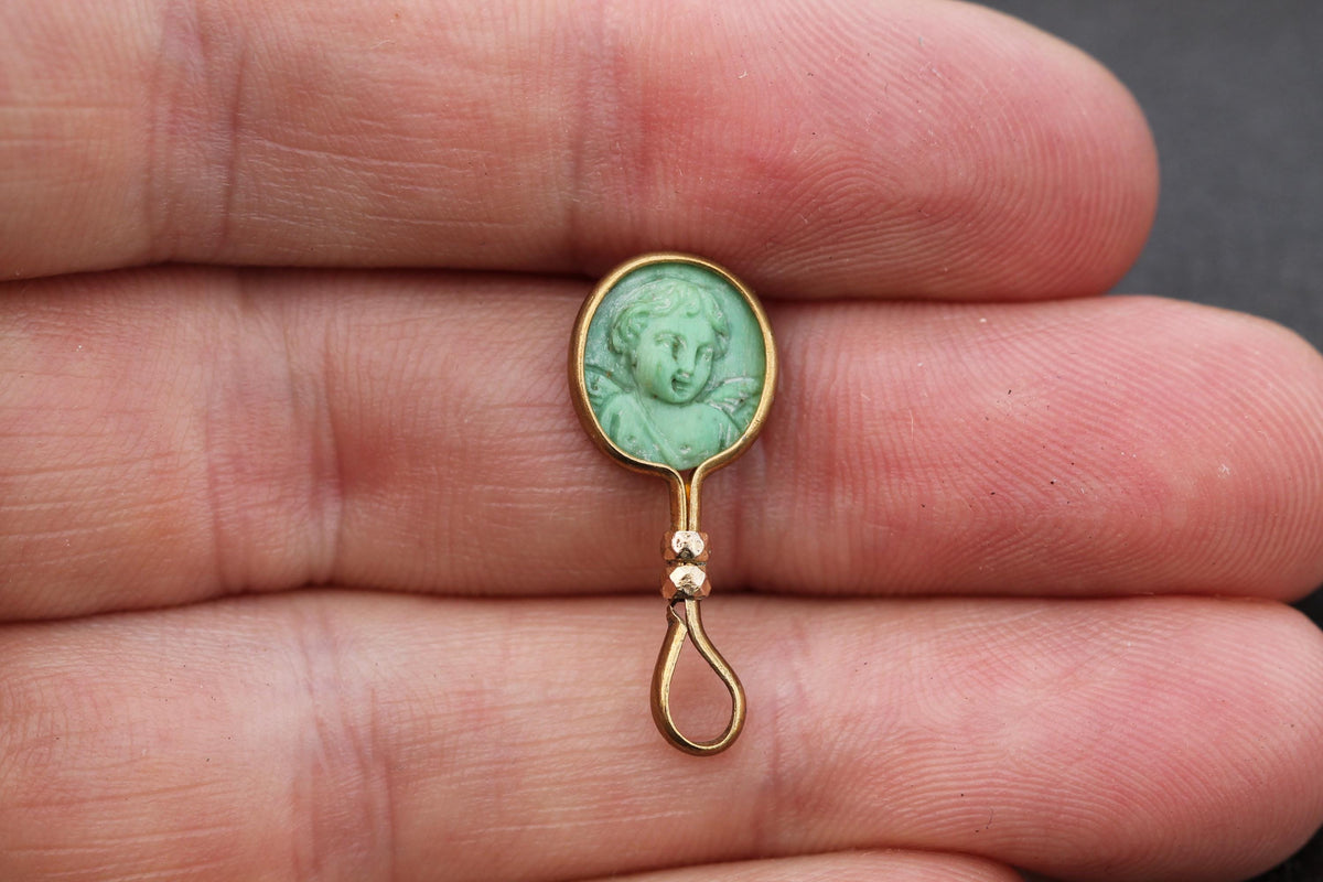 Antique 9ct rolled gold pendant with miniature green cherub portrait