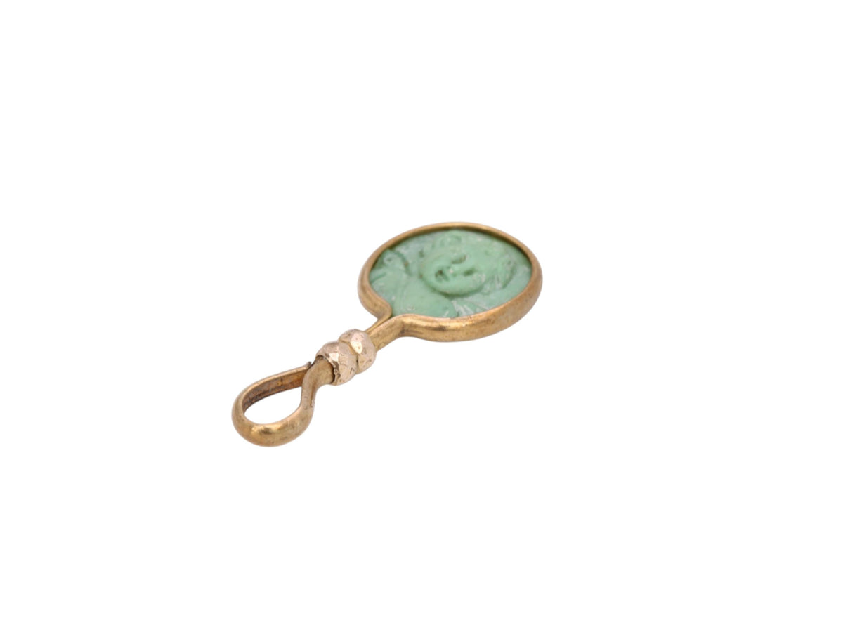 Reverse of antique rolled gold cherub pendant showing plain green plaque